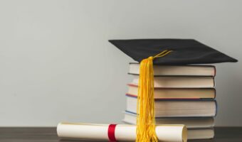grad-cap-diploma-and-stacked-books - Classroom Rules